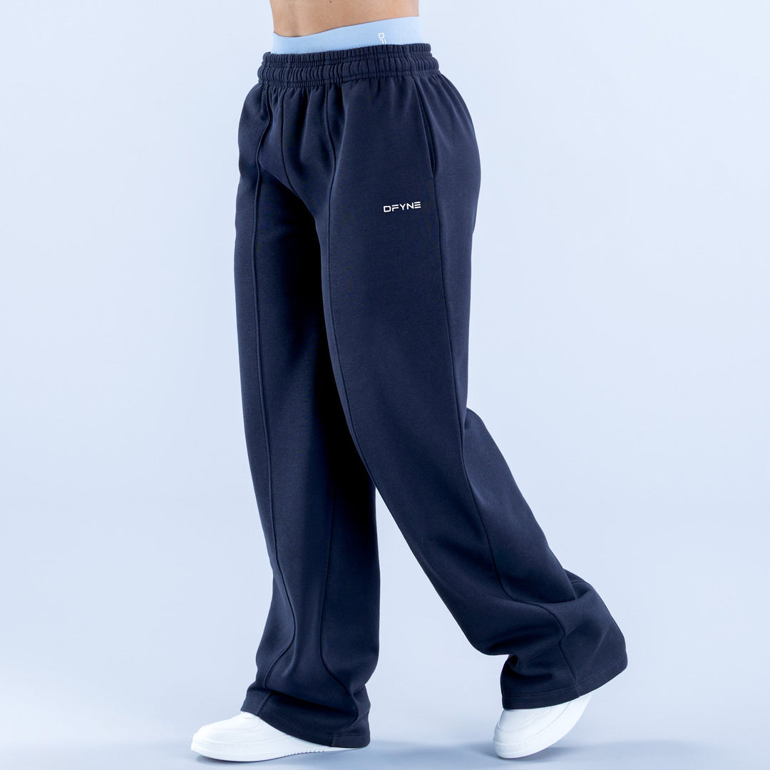 Navy wide-leg jogger pants with elastic waistband and small front logo