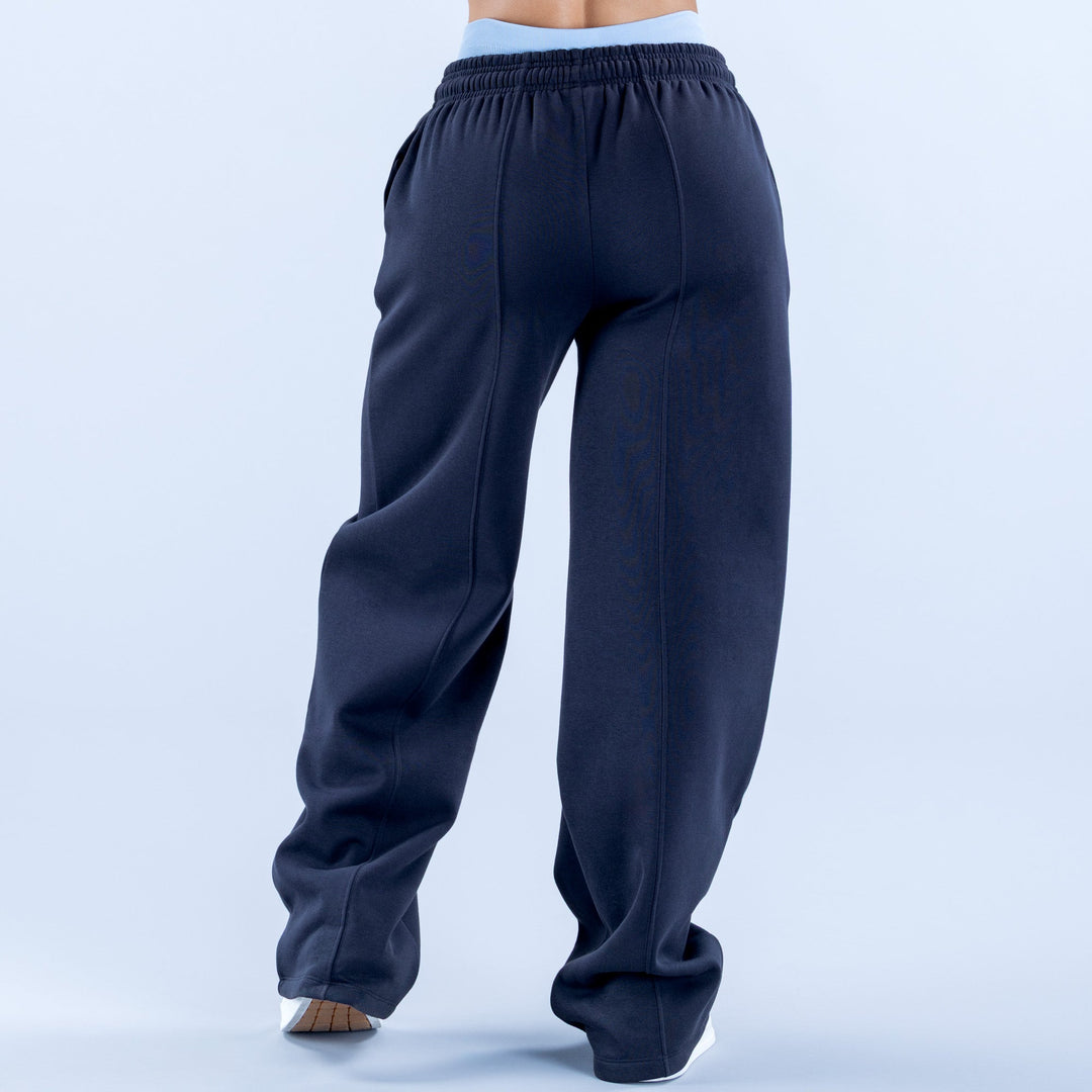 Navy wide-leg jogger pants viewed from back with elastic waistband