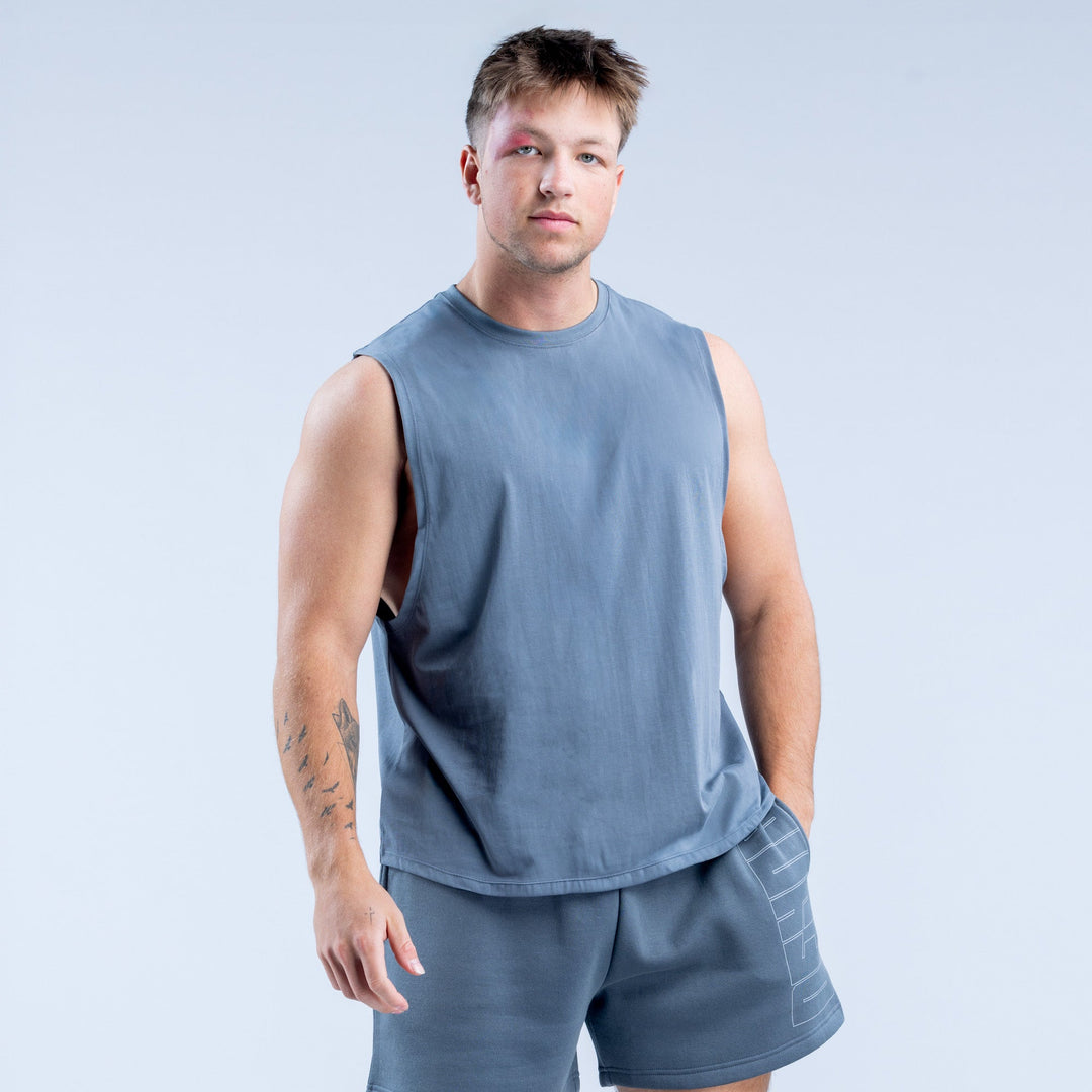 Men's blue sleeveless crew-neck graphic tank top, solid front