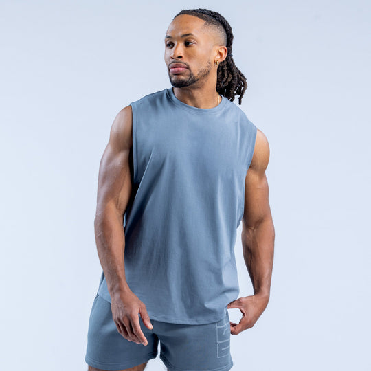 Men's blue sleeveless crew-neck graphic tank top, front view