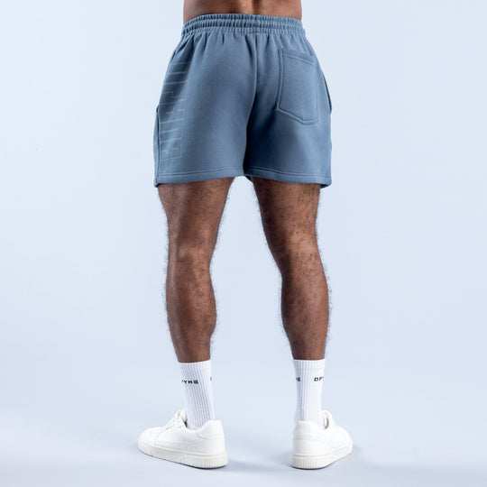 Men's denim-blue graphic shorts, back view, elastic waistband and side pocket