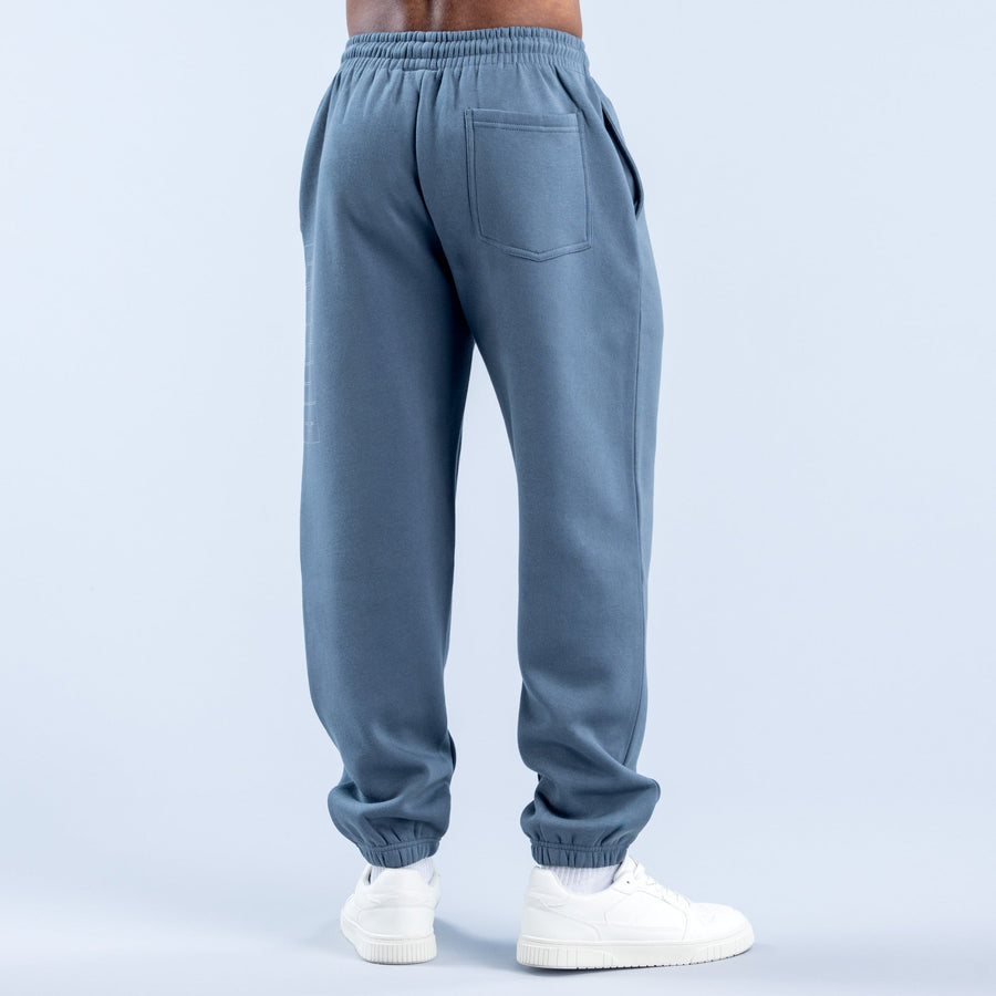 Blue jogger pants with elastic waistband and back pocket detail, cuffed hems