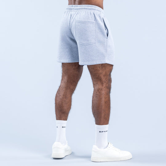 Light blue heather shorts, back view with patch pocket and elastic waistband