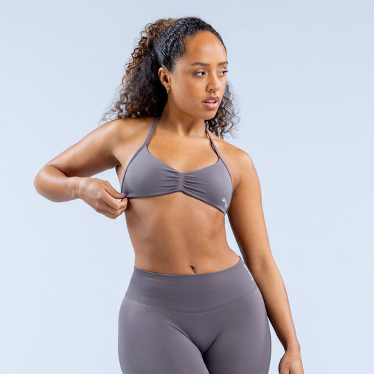 Strappy sports bra with knot-front cups and thin straps in dark gray