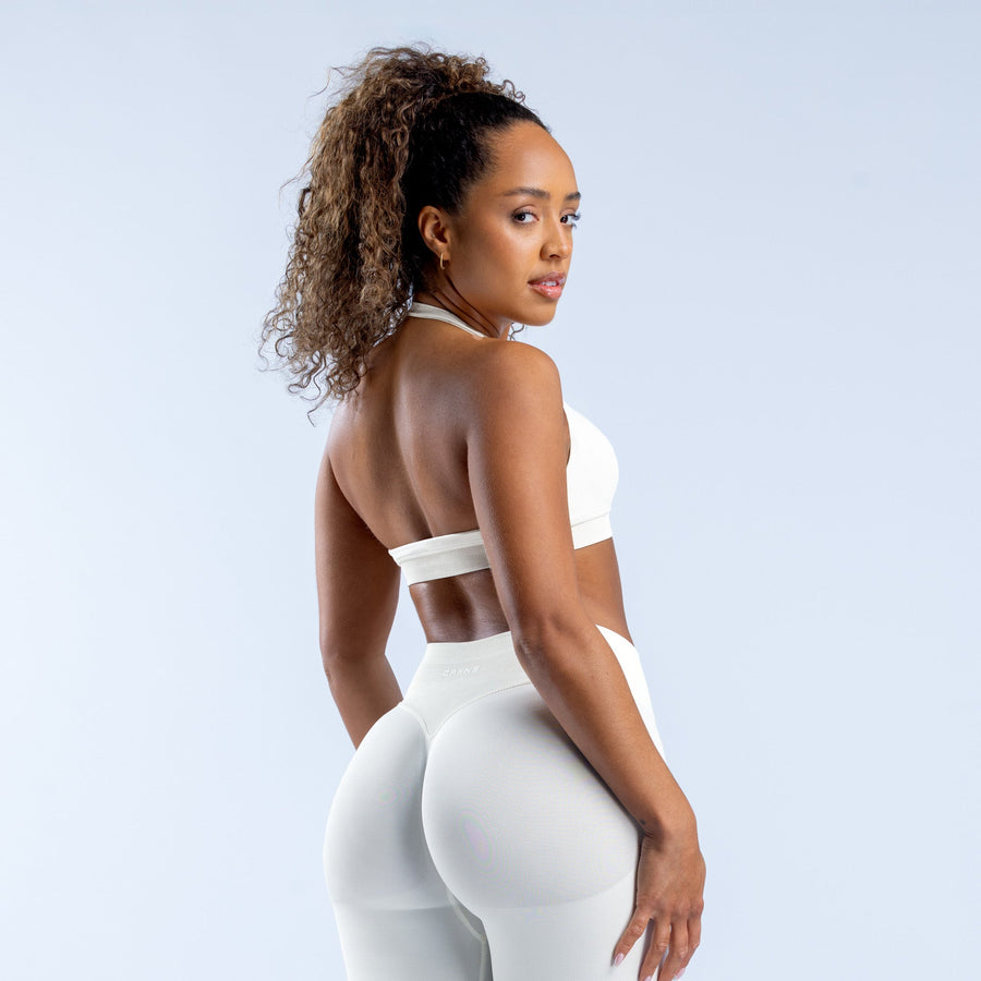 White sports bra back view with racerback straps