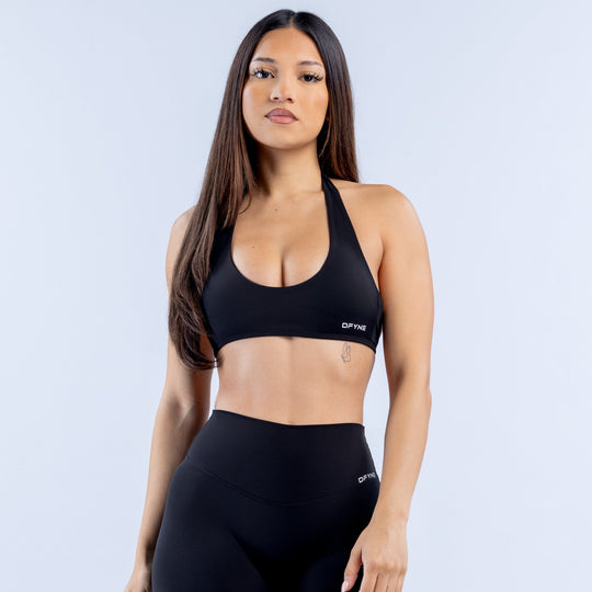 Black backless halter bra with scoop neckline and thin back straps