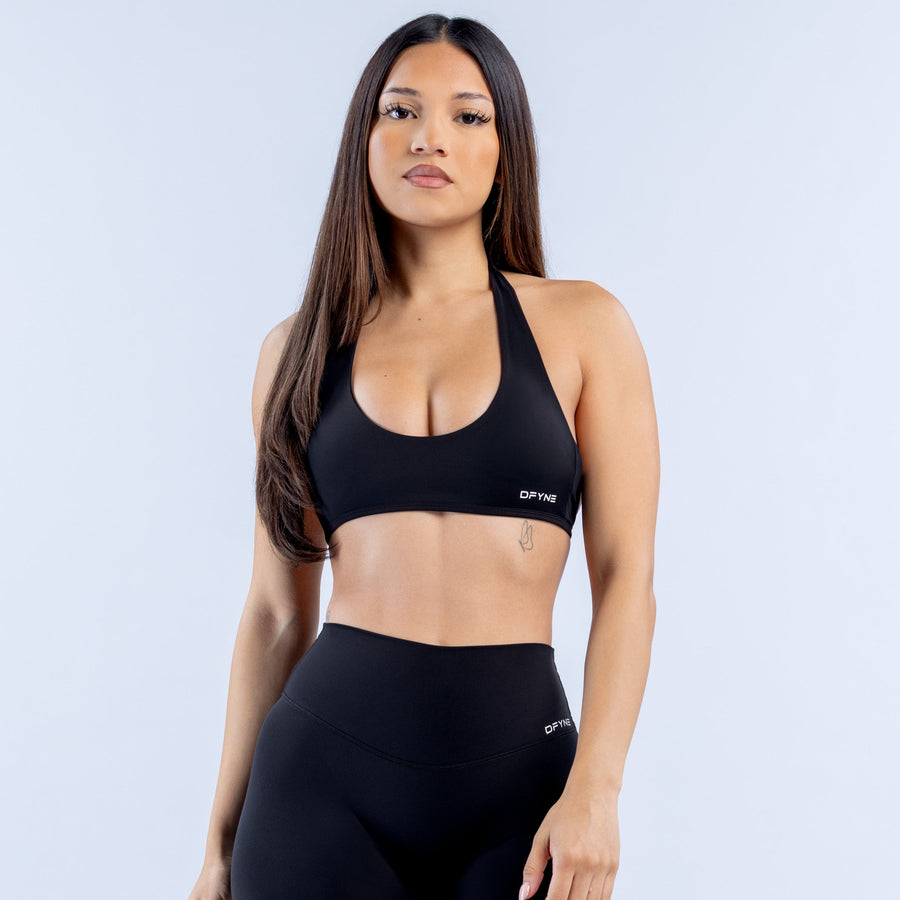 Black backless halter bra with scoop neckline and thin back straps
