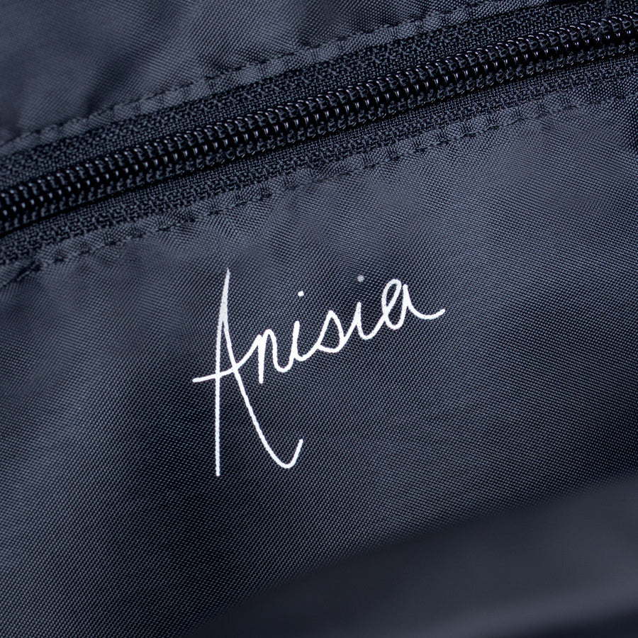 Anisia mini duffle bag, dark fabric with white embroidered logo