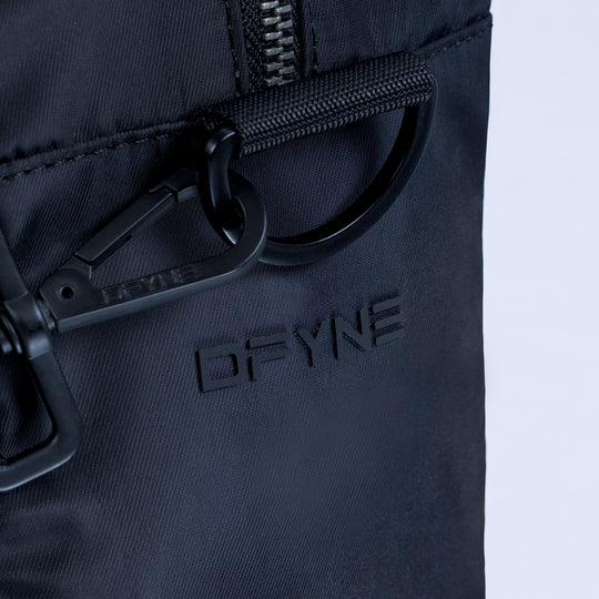 Mini duffle bag front zipper with round pull and logo patch