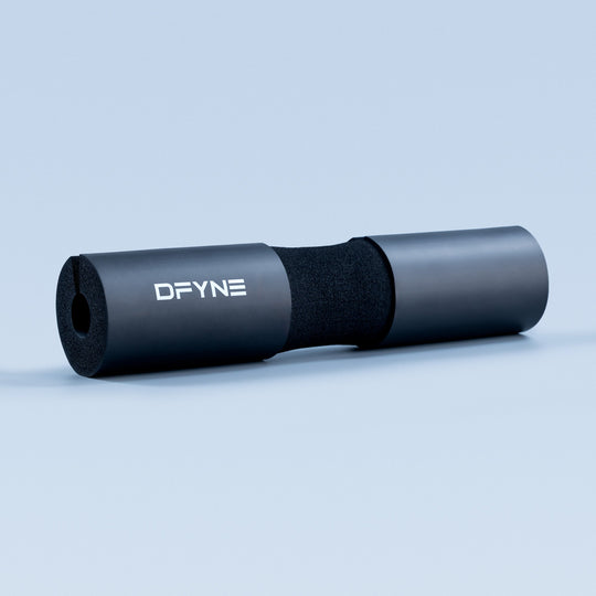 Black barbell pad with DFYNE logo, foam core and cylindrical sleeve