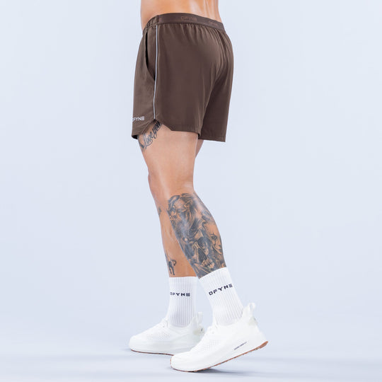 Men's dark brown 4-inch training shorts with side stripe and elastic waistband