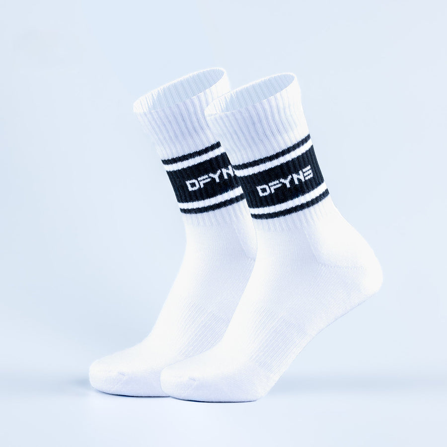 Pair of white crew sports socks with black stripe logo on cuff