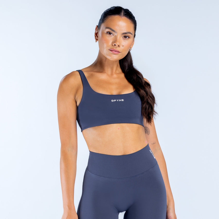 Scoop-back sports bra, dark navy with scoop neckline and fitted stretch fabric