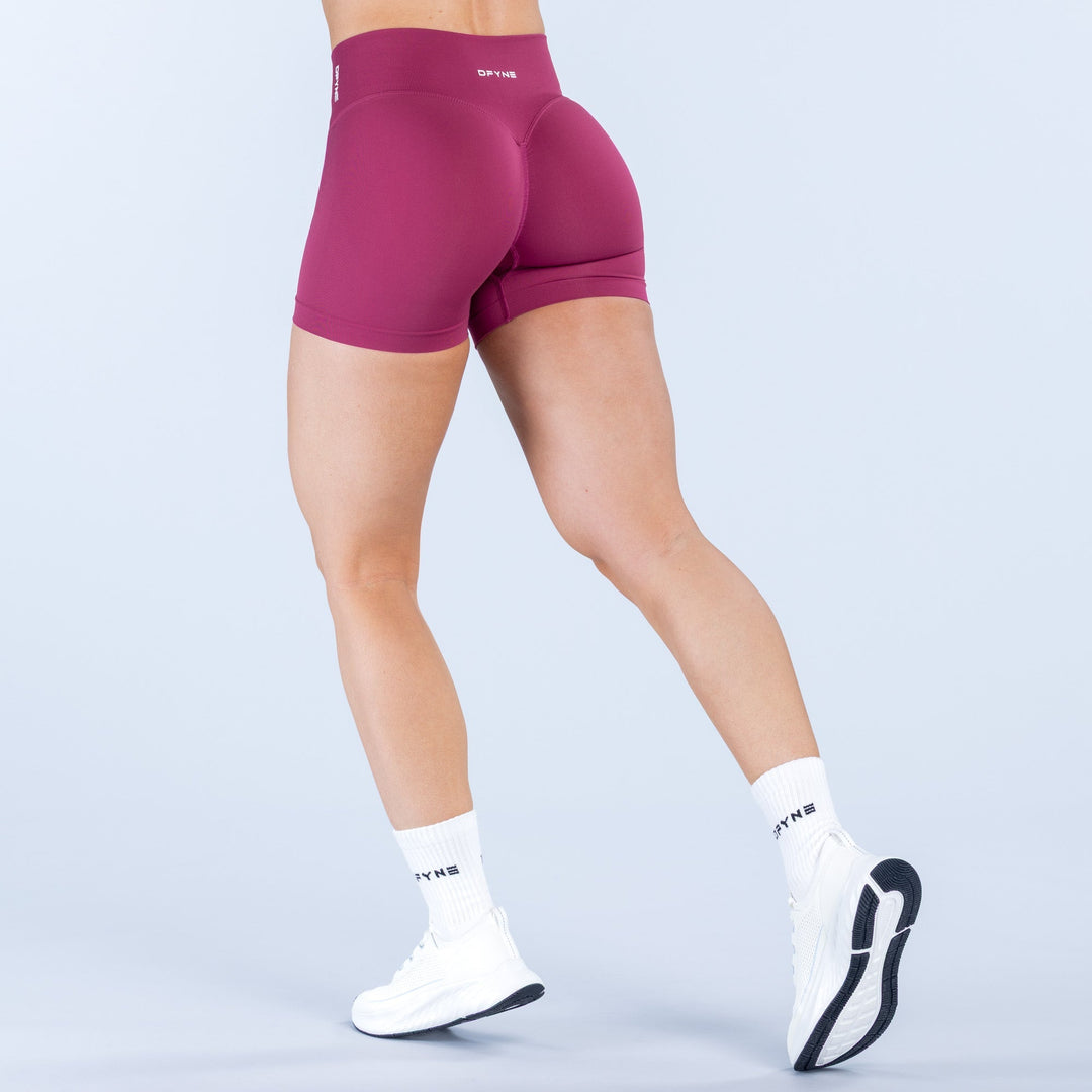 Magenta 4.5-inch athletic shorts with back seam and wide waistband