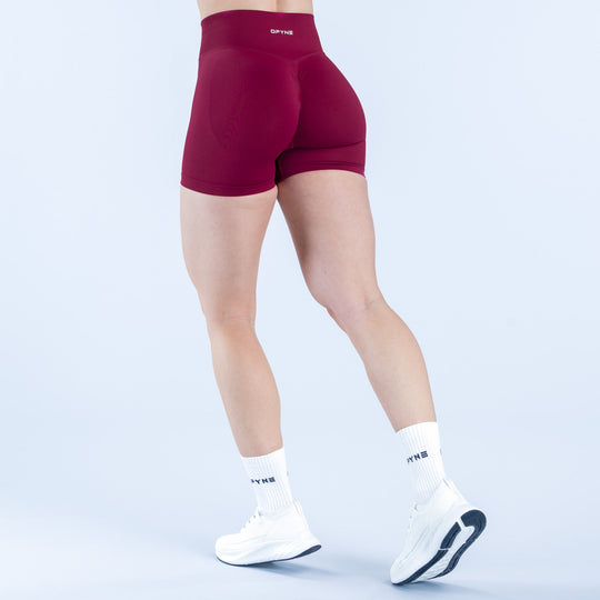4.5-inch athletic shorts, maroon, with back seams and small white logo on thigh