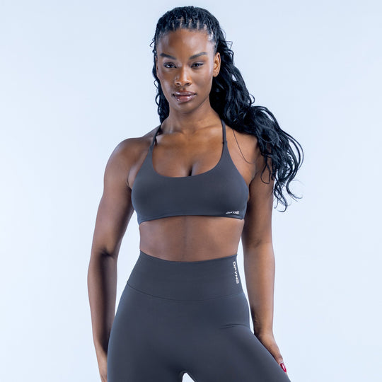 Dark performance sports bra with scoop neckline and slim straps
