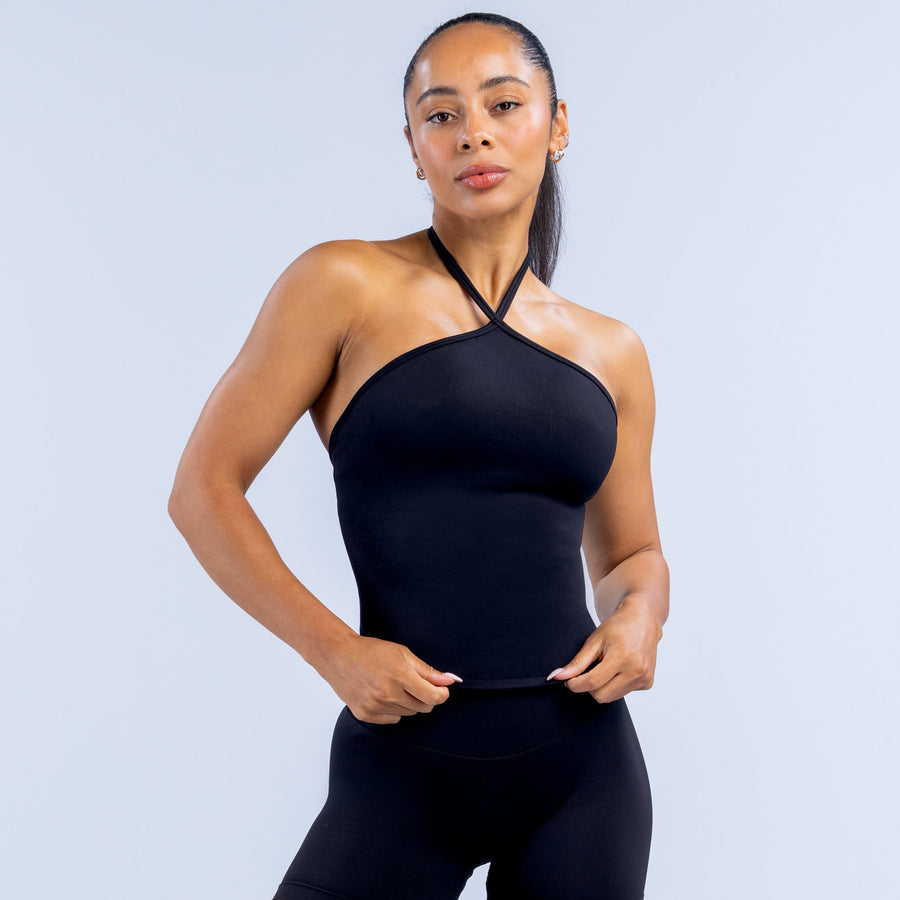 Black longline halter top with cross halter neckline and smooth fitted bodice