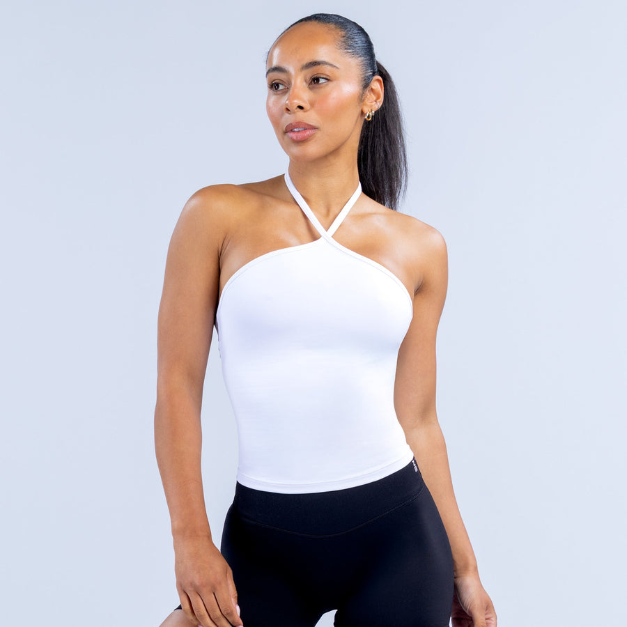 White longline halter top with halter neck and fitted longline hem
