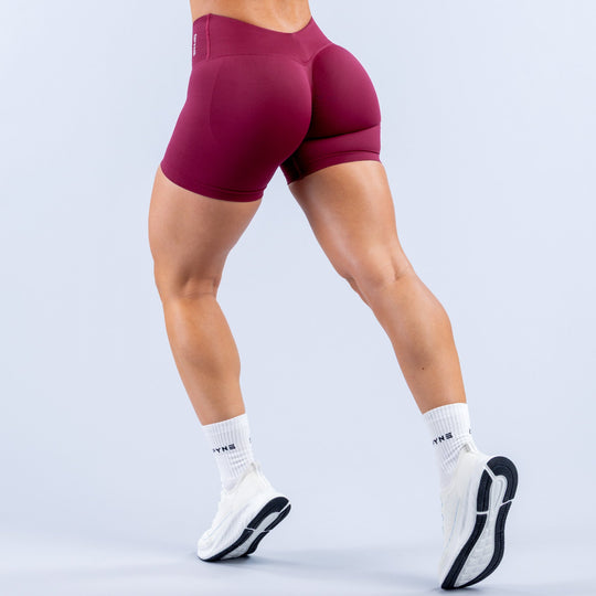 Maroon 4.5-inch athletic shorts, rear view, high-stretch waistband