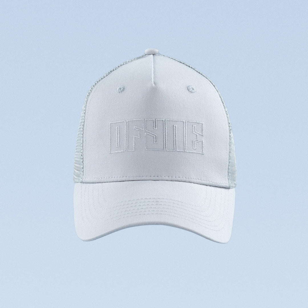 White trucker cap with raised front logo embroidery and curved brim