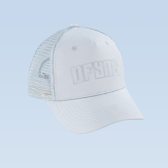 White trucker cap with front logo and mesh back panel, curved brim