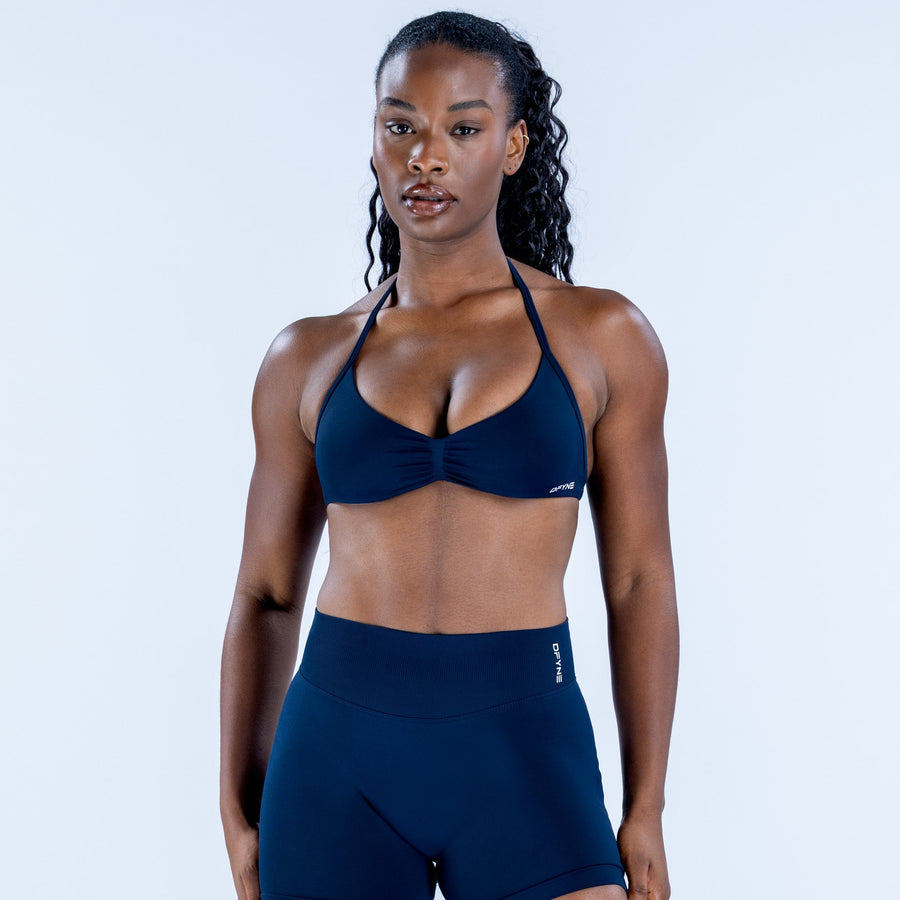 Front view dark navy strappy bra with V-neck and gathered center seam