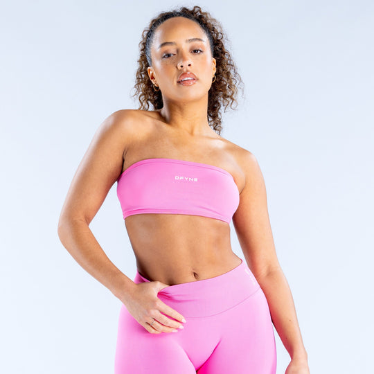 Pink backless bandeau with wide underband and sporty compression fit