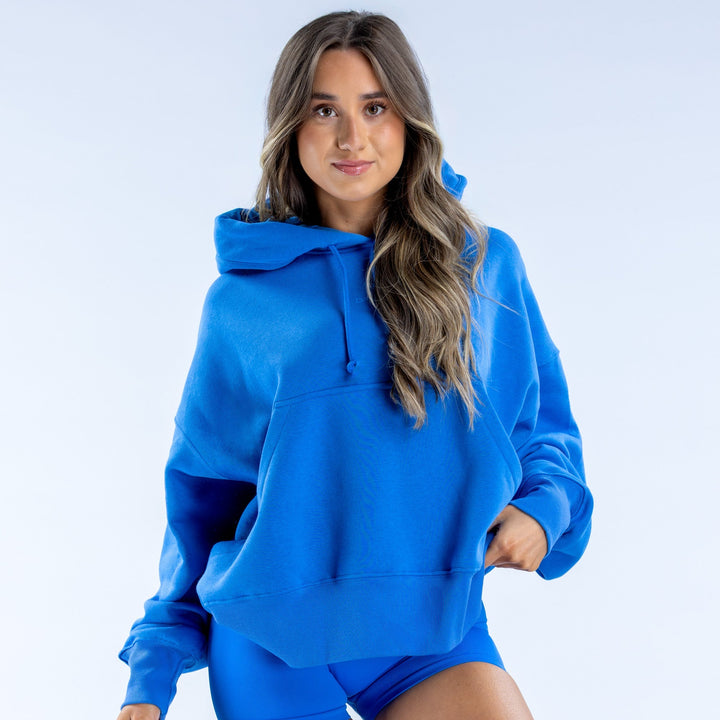 Blue pullover hoodie with hood, drawstring, kangaroo pocket and long sleeves