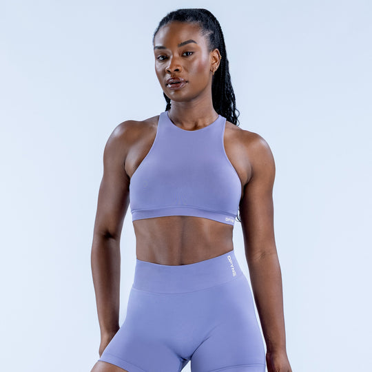 Lavender racerback sports bra with high neckline and smooth cropped fit