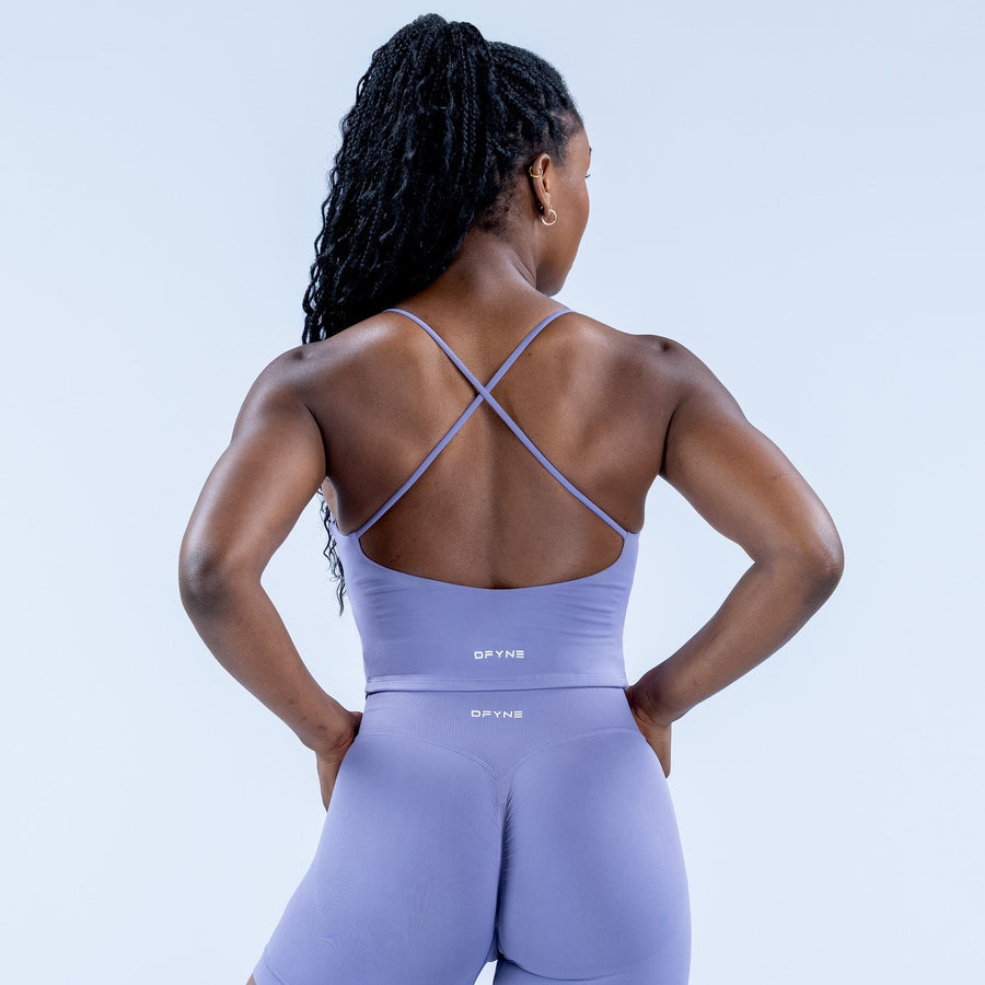 Lavender strappy sports top with crisscross back straps and open back