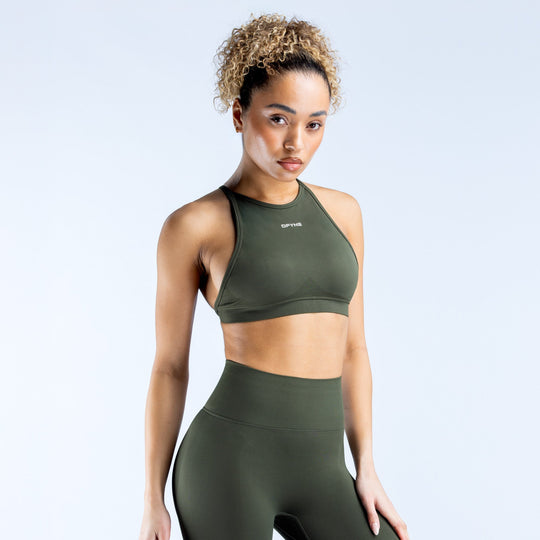 Olive high-neck sports bra, racerback style and smooth compression fit