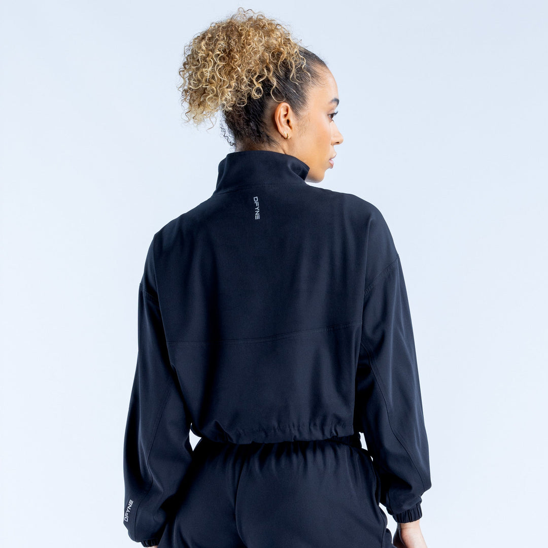Black cropped zip-up jacket, back view, high collar with quarter zip, elastic cuffs