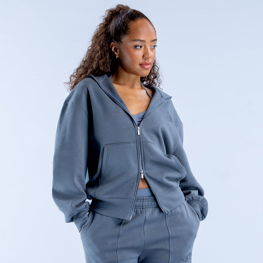 Blue zip hoodie with full zipper, hood, and kangaroo pocket detail