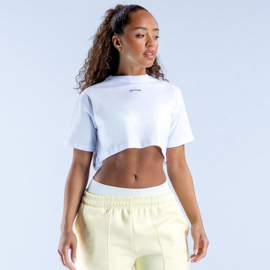 White cropped crew-neck tee with short sleeves, angled back view