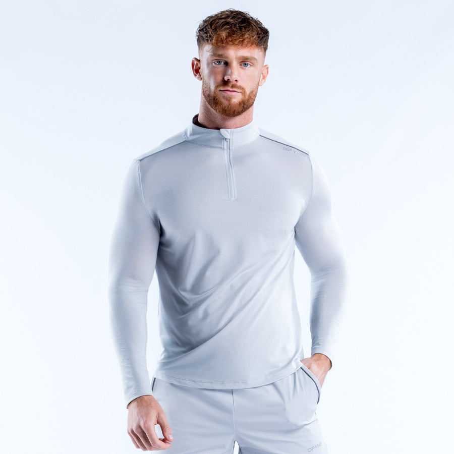 Men's light blue quarter-zip pullover with long sleeves