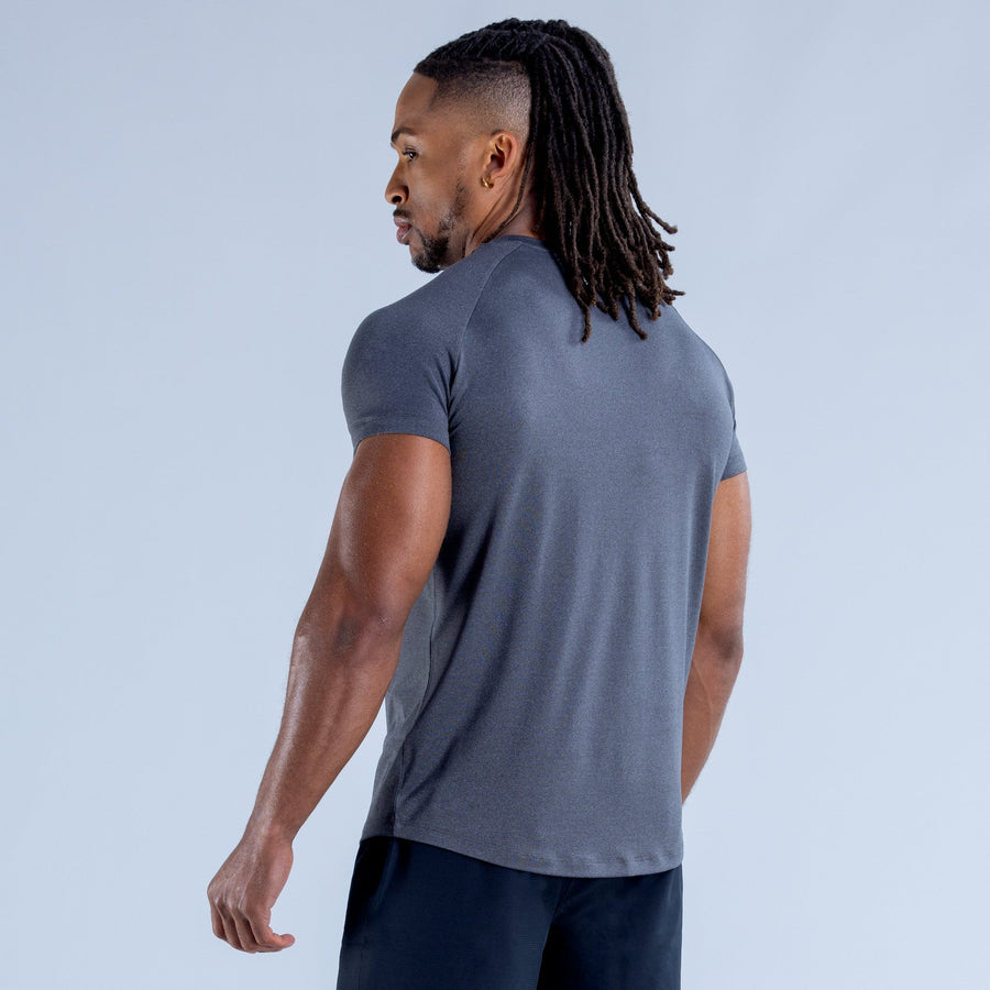 Men's training T-shirt in dark gray, crew neck, short sleeves, side view.