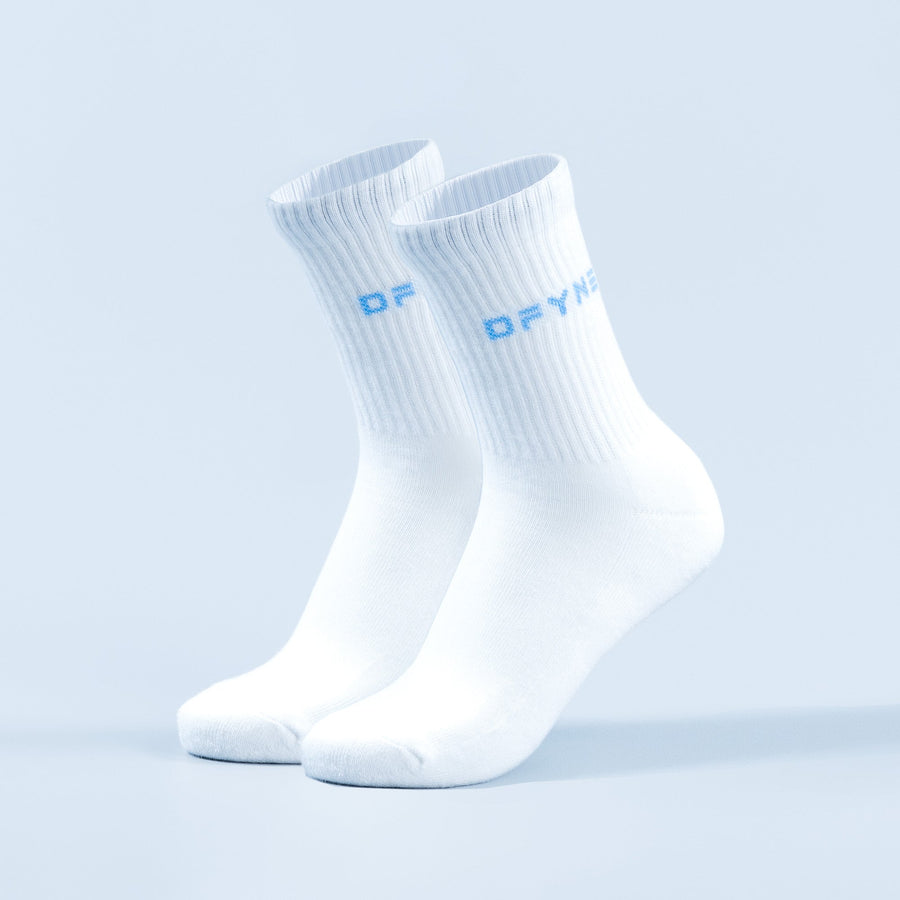 White crew socks with blue logo text on front