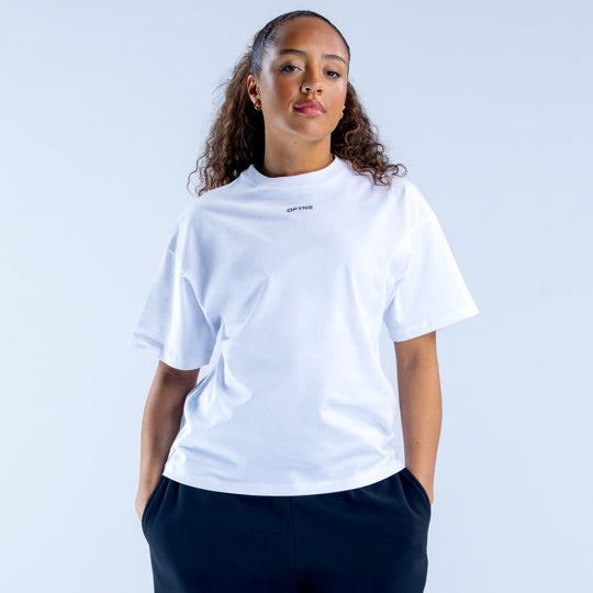 White boxy crew-neck T-shirt with short sleeves and front logo detail