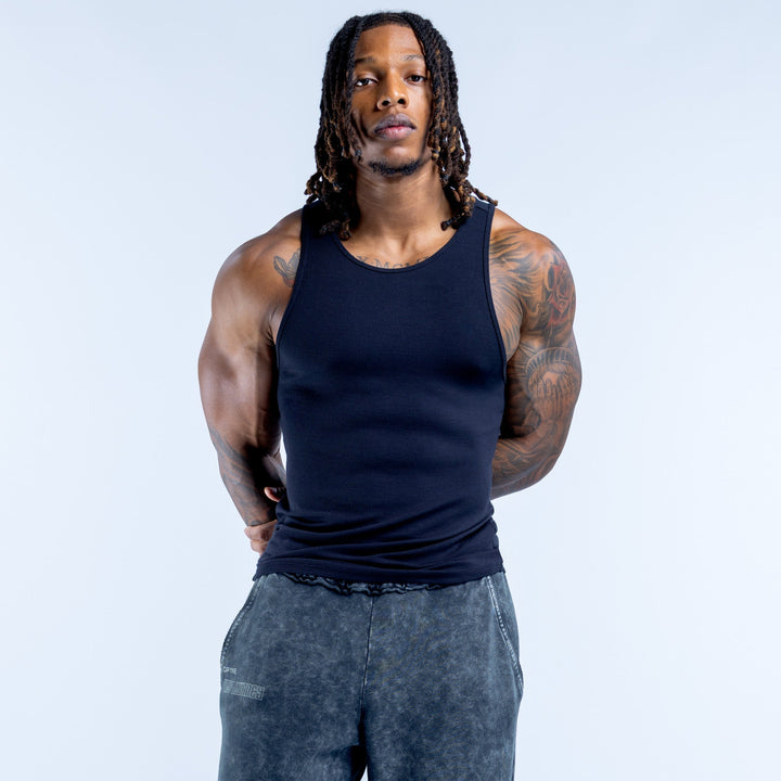 Navy ribbed sleeveless vest with crew neck, fitted knit