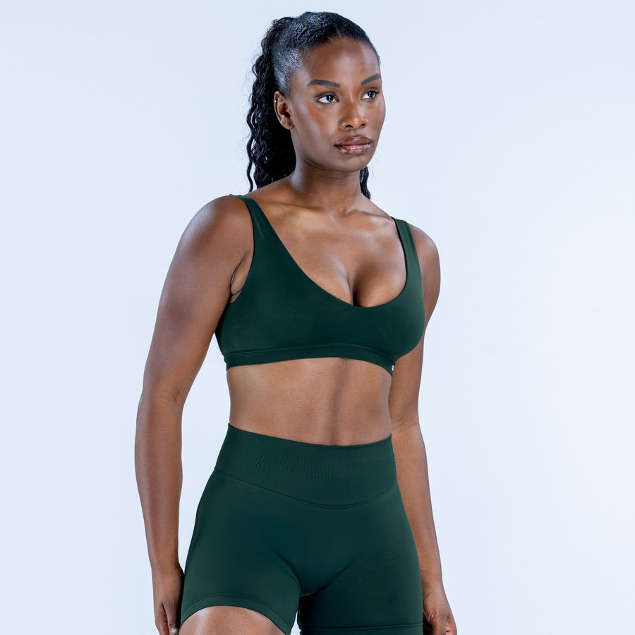 Impact scoop back bra in dark green with supportive V neckline and soft cups