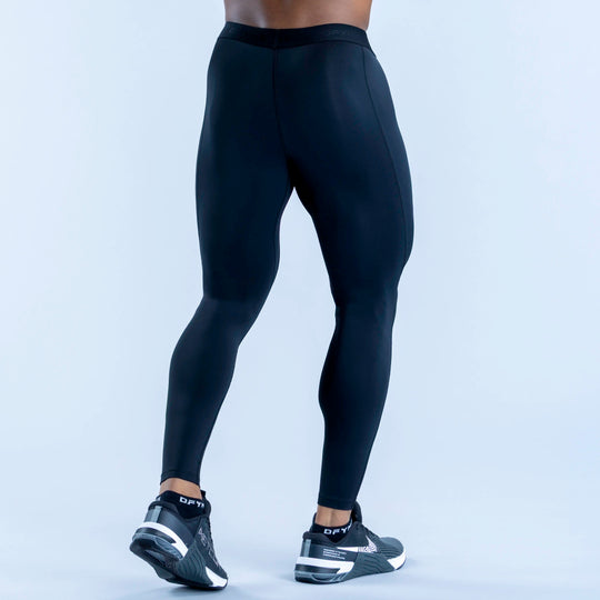 Black full-length compression base layer leggings, rear view with contoured seam lines