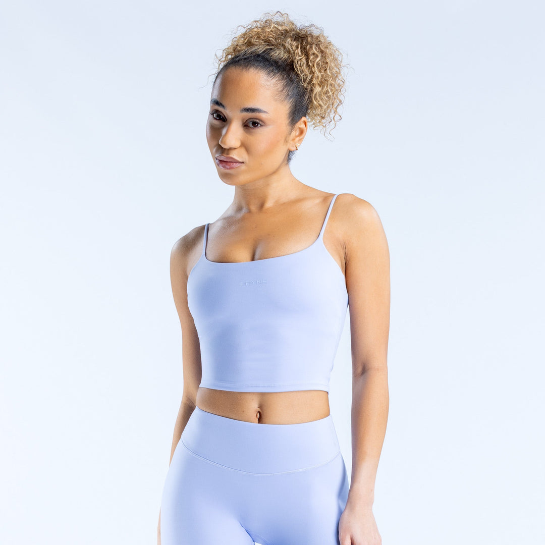 Light blue strappy crop top with square neckline and thin spaghetti straps