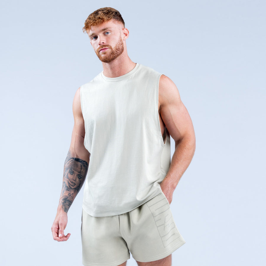 Light sage graphic tank top with crew neckline and front square logo print