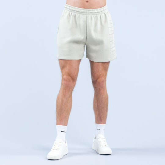 Light green graphic shorts with elastic waistband, back view