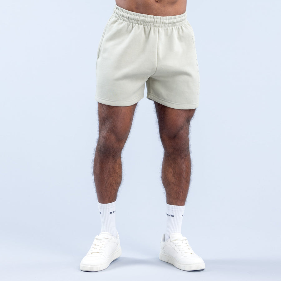 Light green graphic shorts with elastic waistband, front view