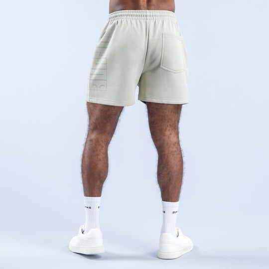 Light green graphic shorts, back view with side pocket and embossed print