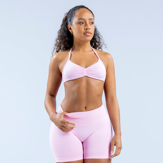 Light pink strappy bra with ruched middle detail and thin spaghetti straps