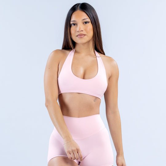 Backless halter bra in light pink, scoop front, smooth fitted cups