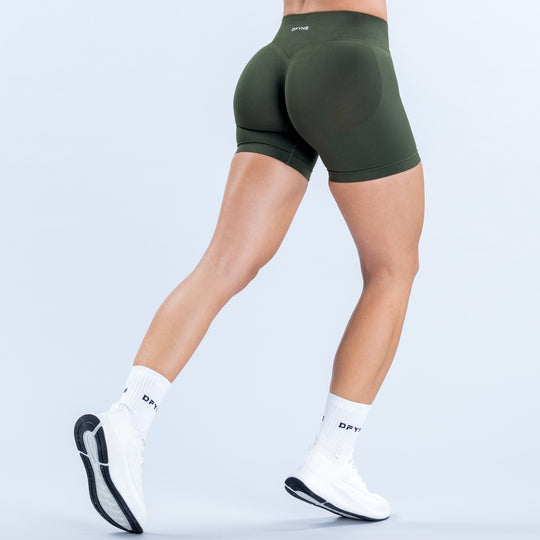 Dark green fitted shorts with a high-rise waist, shown from the back.