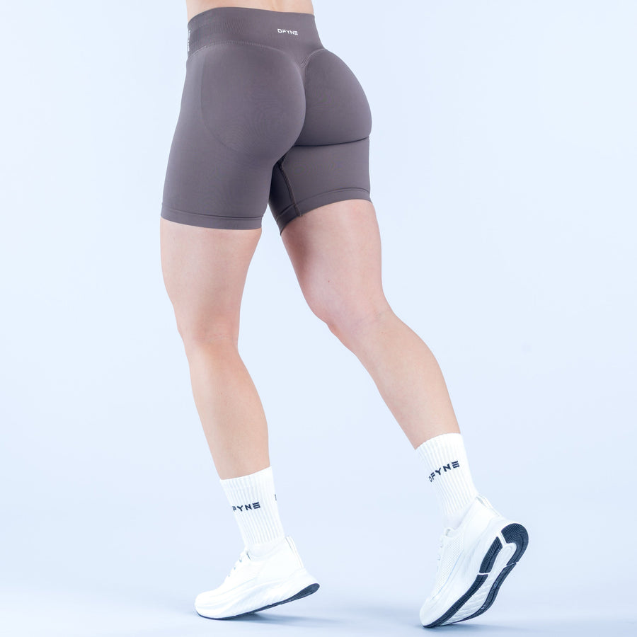 Dark gray 6.5-inch bike shorts with logo tag at back waistband